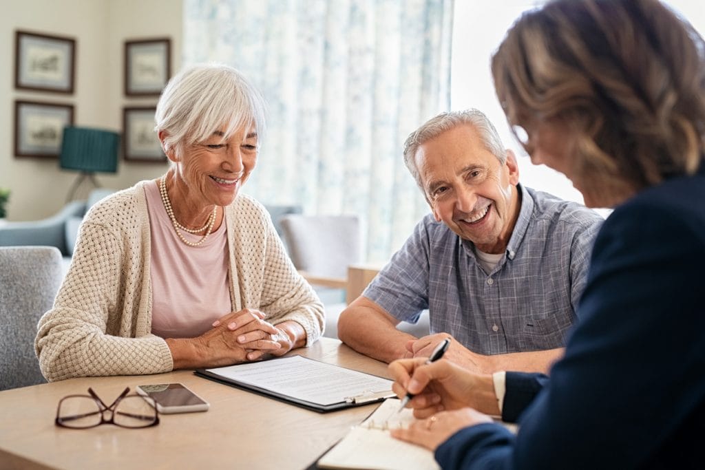 Couple receiving equity release advice from the comfort of their own home.